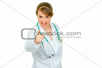 Evil medical doctor woman shaking her finger
