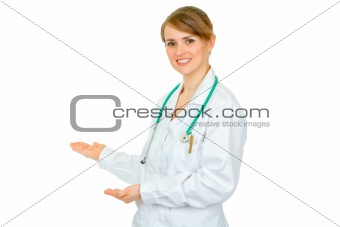 Welcome! Friendly medical doctor woman inviting to cooperation
