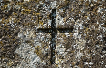 Old cross at grave of 19th century.