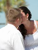 Newlyweds having a romantic kiss
