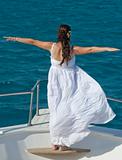 Bride on the bow of a boat