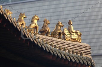 Decoration on the roof of Jing'an temple in Shanghai, China