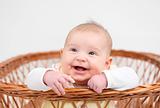 Little baby girl in basket