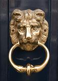 Antique golden door knocker