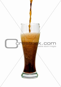 glass goblet and a dark beer with a white background