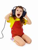 Cheerful little girl sings the music