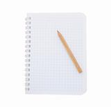 Paper notebook with pencil