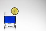 blue cocktail with lemon