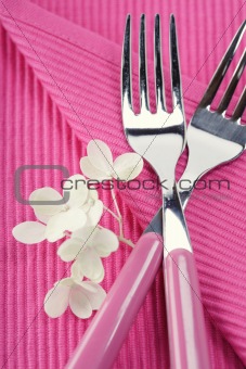 forks and hydrangea flower