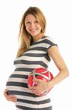 pregnant woman with soccer ball