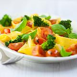 Pappardelle pasta with broccoli and cherry tomatoes