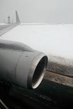 airplane wing aircraft turbine landing in snow winter