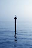 backlight beacon in Mediterranean blue sea reflection