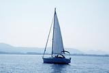 sailboat sailing in blue mediterranean sea