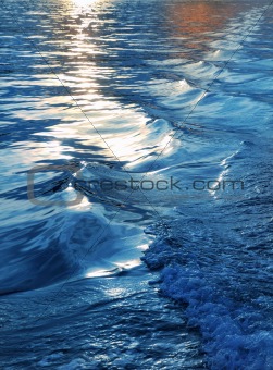 blue sea water waves sunset from ship wake