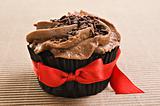 Chocolate cupcake with red bow
