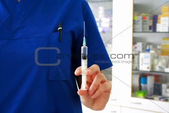 Vaccination concept. Nurse is holding syringe