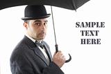  man with bowler hat and an umbrella
