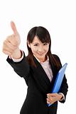 Asian business woman with thumb up