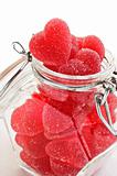 Red heart shaped jelly sweet in a glass jar
