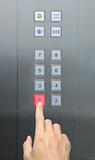 businessman hand press 1 floor in elevator
