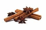 Cinnamon sticks and anise stars on white background