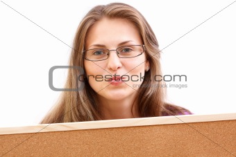 Woman with a cork board