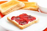 Toast bread with jam on a plate