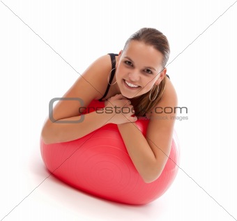 Girl leaning on exercise ball