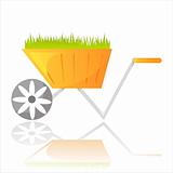 garden wheelbarrow with grass