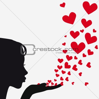 Silhouette woman blowing heart