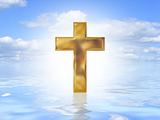 Gold cross on water