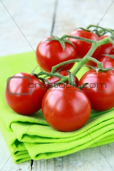 Tomatoes Cherry fresh ripe on the kitchen towel