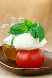 Traditional Italian Caprese salad tomato mozzarella cheese and basil