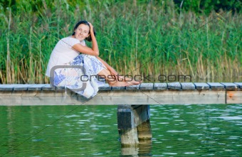 Young Woman On Pier
