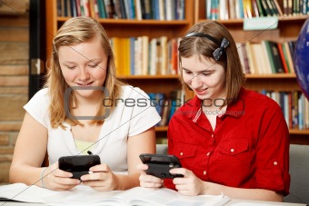 Teens Texting in Library