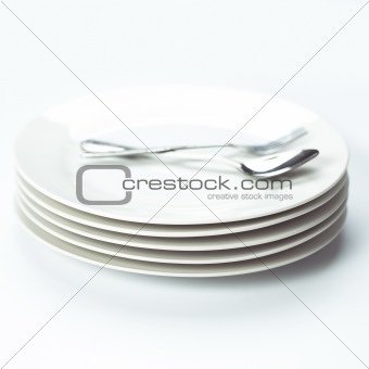 stack of white dining plates