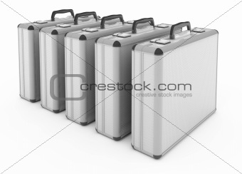 Metallic silver briefcases isolated on white