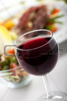 glass of red wine and dinner