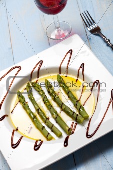 green asparagus on a white plate