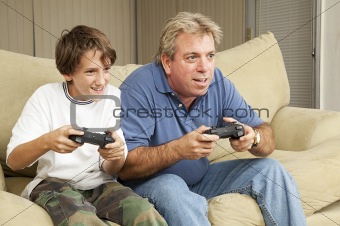 Man and Boy Play Video Games