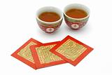 Chinese longevity tea cups and red packets