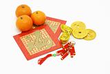 Chinese New Year ornaments, oranges and red packets