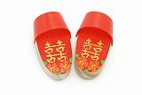 Pair of red Double Happiness clogs