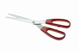 A pair of red scissors isolated on white