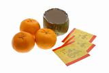 Chinese New Year rice cakes, oranges and red packets