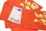 Chinese New Year red packets and Euro currency note
