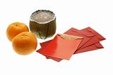 Chinese New Year cake, oranges and red packets