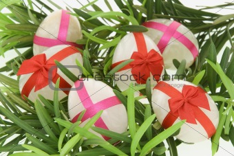 Decorated egg shaped stones for Easter