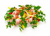 Ham roll with fresh vegetables and parsley.